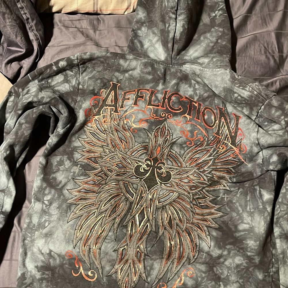 Never worn but has been washed twice.